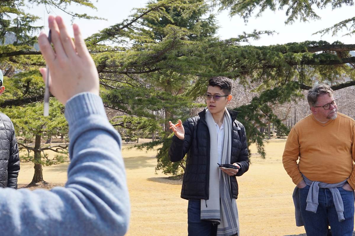 Rikio Inouye speaking to students outdoors during the Korean War staff ride